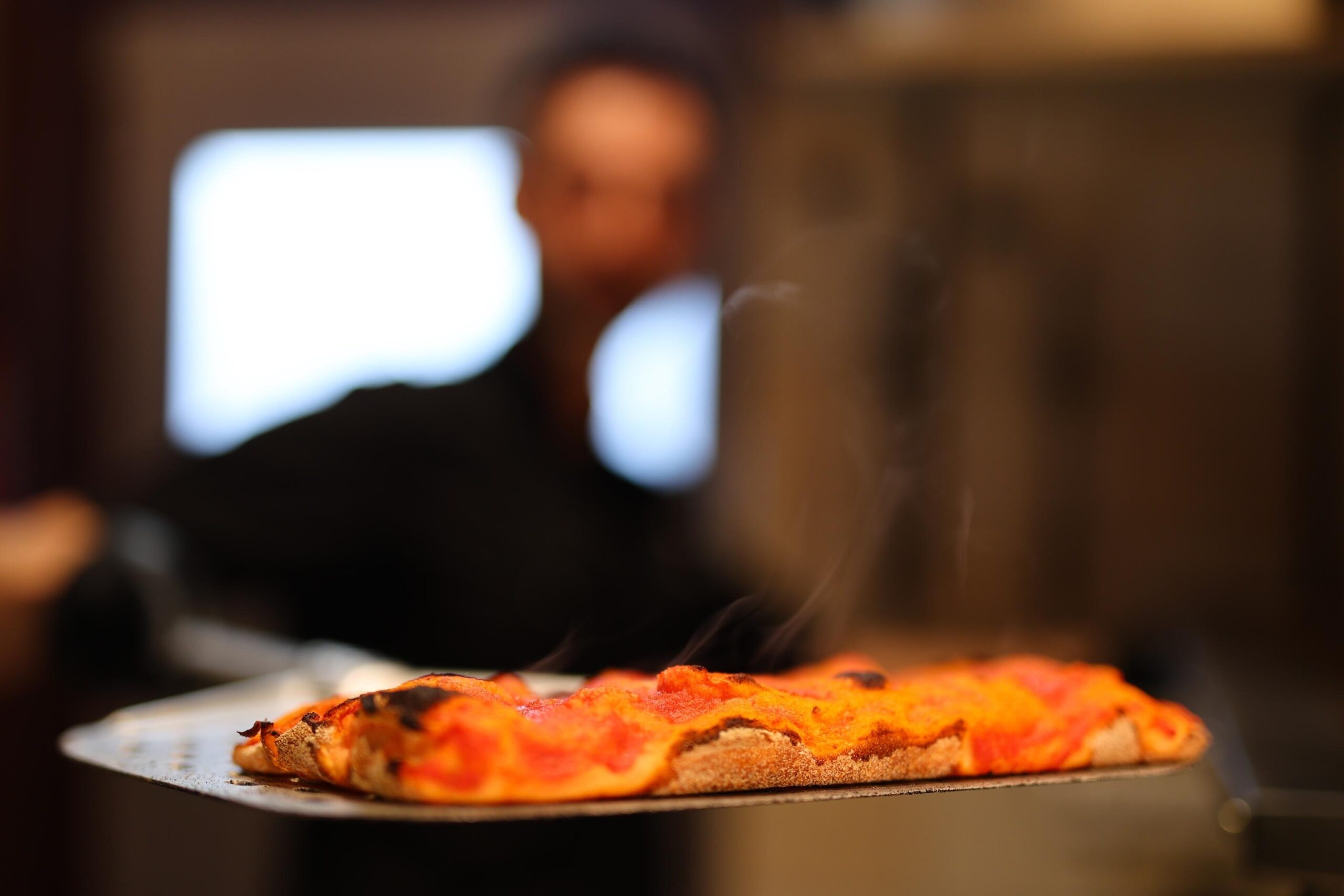 hot pizza with smoke